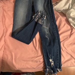 Jeans distressed at the bottom